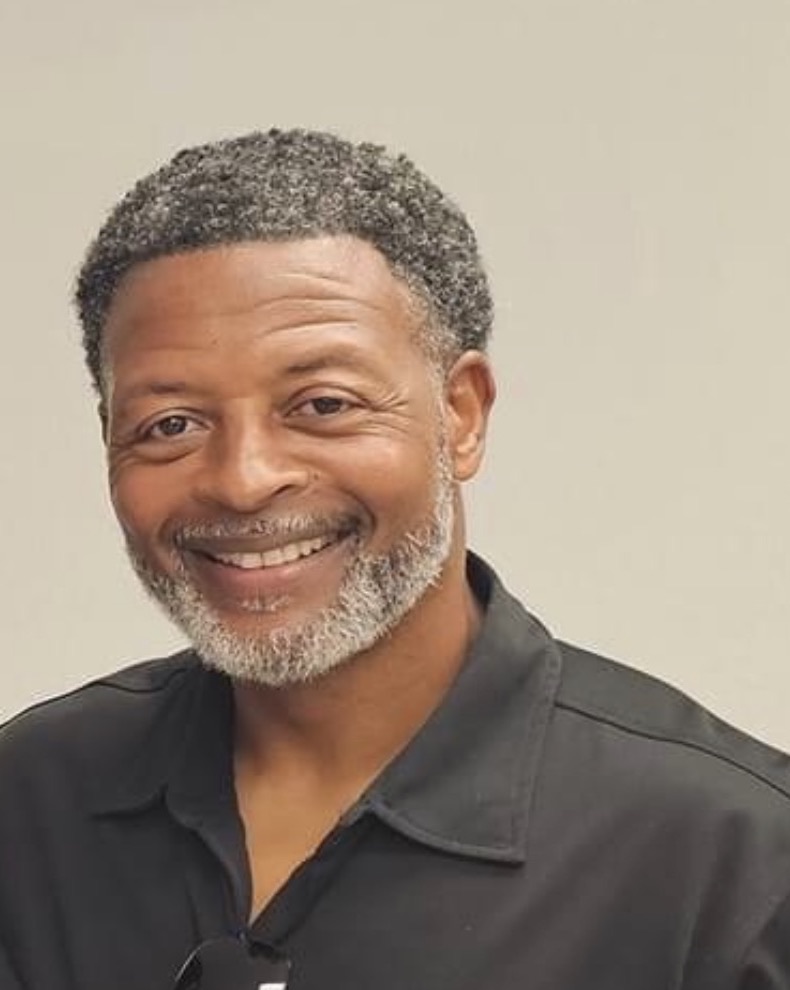 Jimmy Sloan, owner of The Pro-Stucco Handyman, smiling