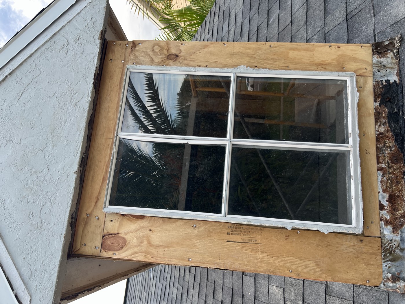 The dormer stripped and re-sheathed with new plywood