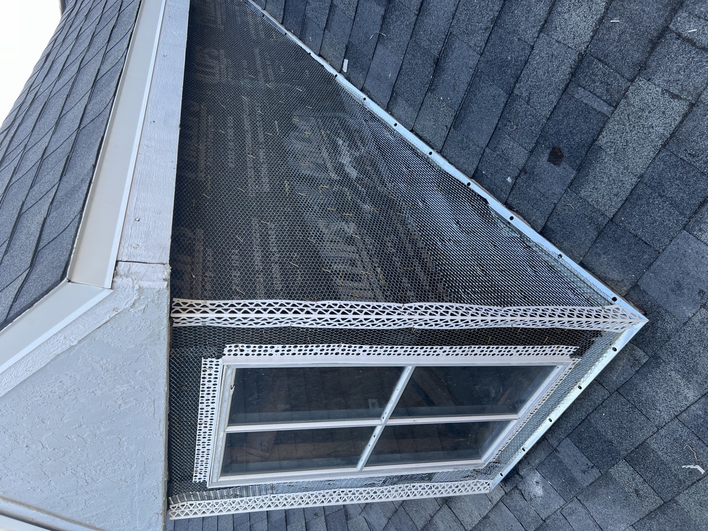 The dormer wrapped in paper and metal lath